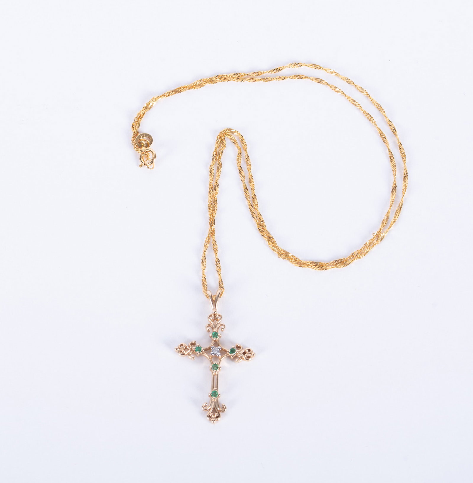 Lovely 14K Yellow Gold Diamond & Emerald Cross Necklace: The chain is 19 inches long and the cross is 1 1/4 inches long. Weight including stones is 4g.