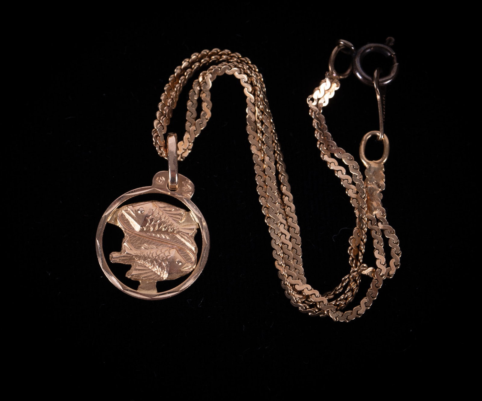 14K Yellow Gold Bracelet with a Pisces Charm - Italy: This double chain bracelet measures 7 inches long and weighs 3.5g.
