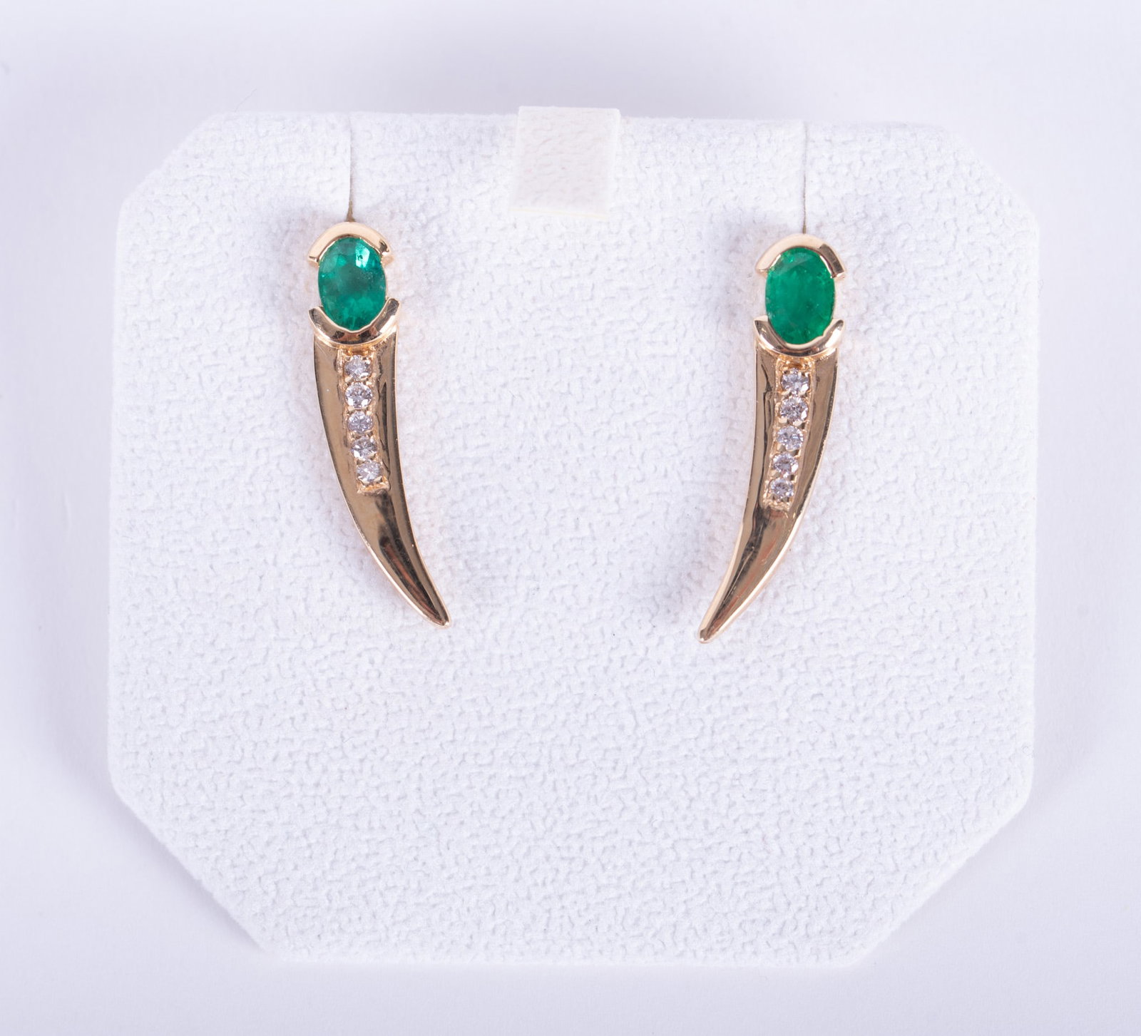14K Yellow Gold Diamond & Emerald Earrings: The emeralds measure 6.25mm x 5.10mm each. Diamond weight is approximately .25ctw. Length is 1 1/4 inches and the weight including stones is 4.4g.