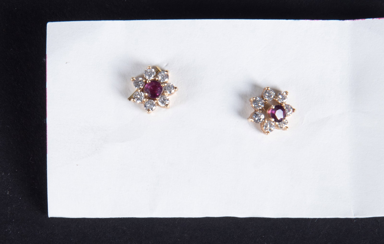 14K Yellow Gold Ruby & Diamond Stud Earrings: The versatility of these earrings is a real bonus. The studs can be worn alone and the jackets can be used with other studs. The rubies measure 3.40mm each and the diamond weight on the jackets is app