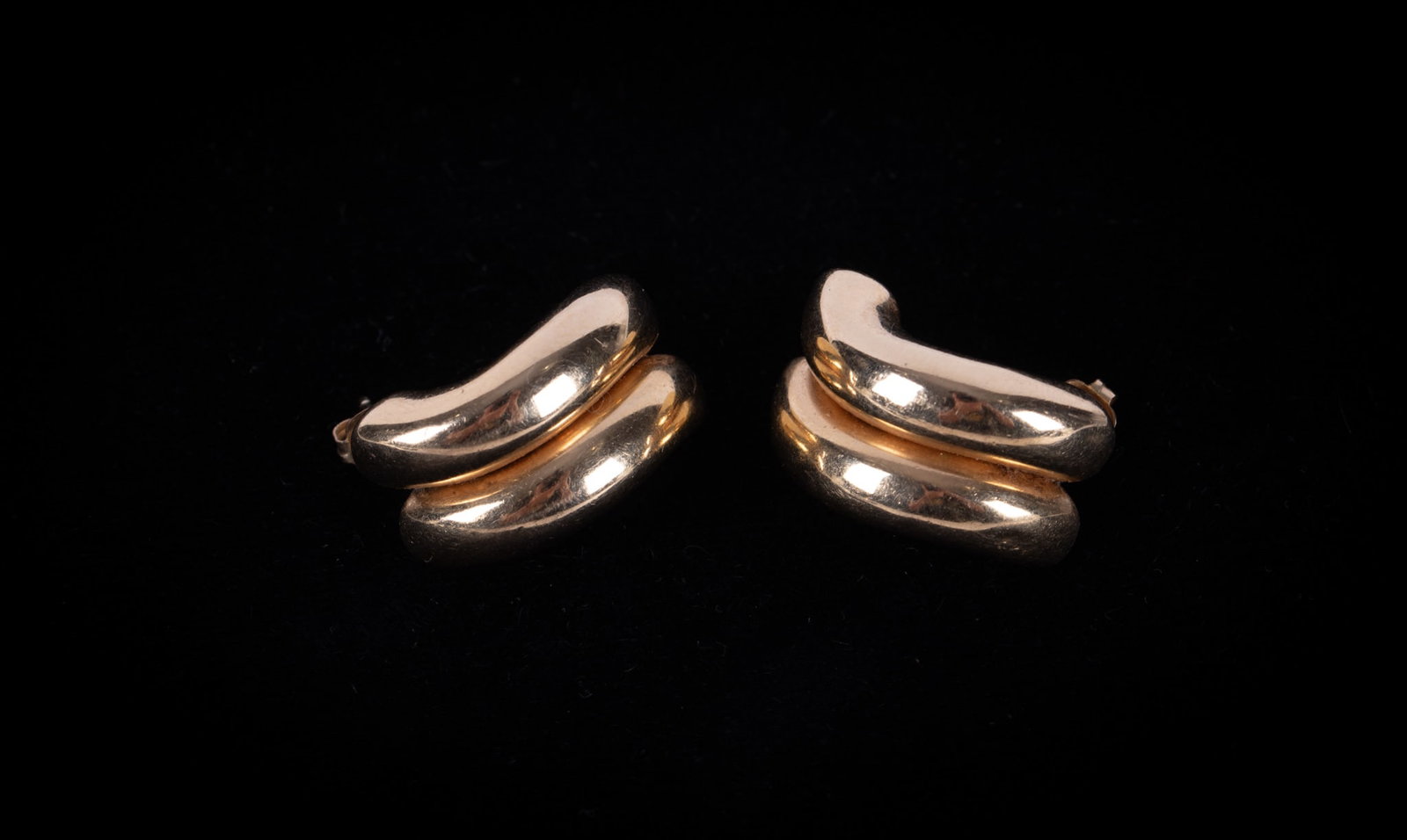 14K Yellow Gold Half Hoop Earrings: The earrings test 14K, measure 7/8 inches and weigh 5.8g. Earring backs are gold filled.