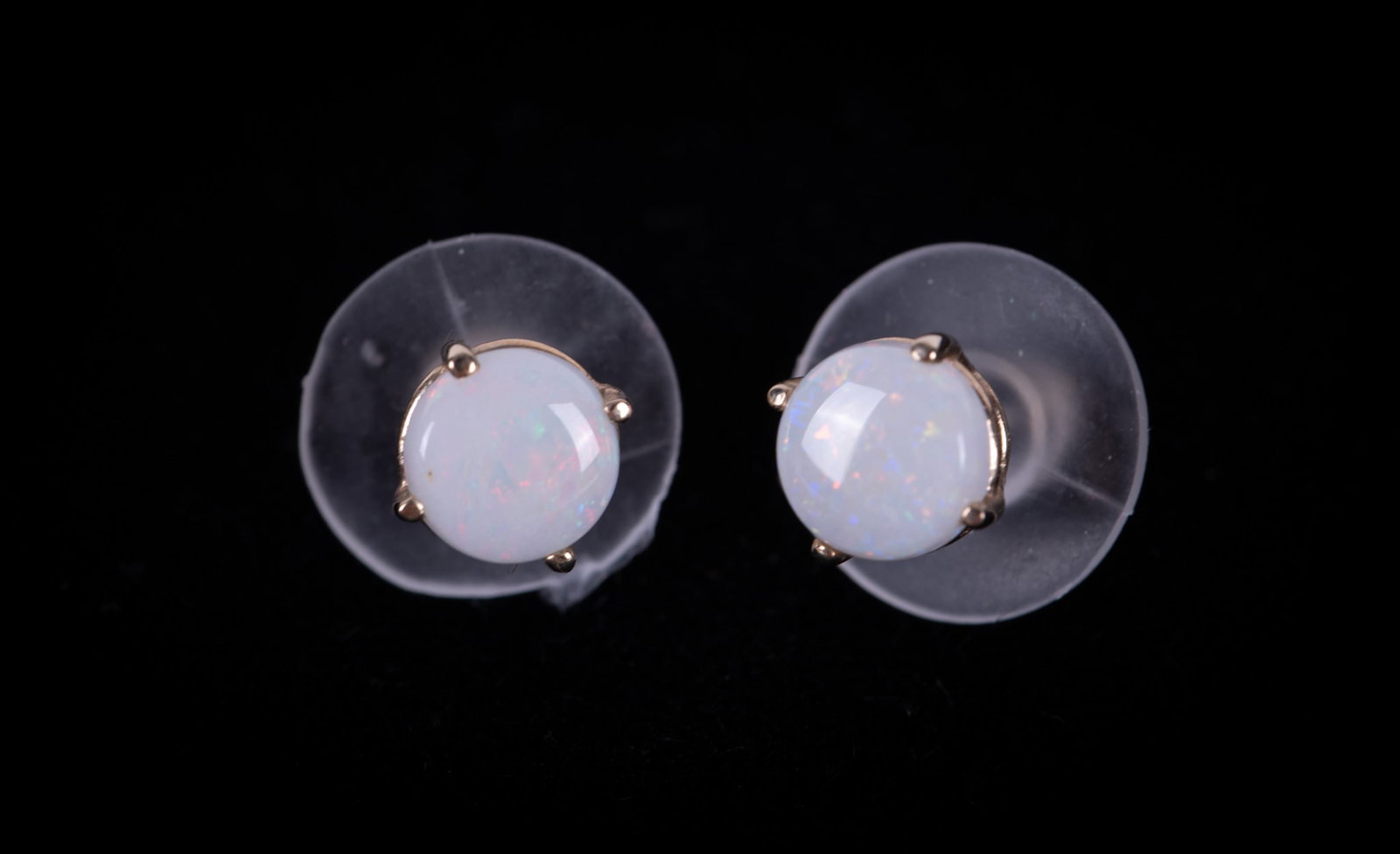 14K Opal Stud Earrings: These earrings weigh .8g including stones. Backs have been replaced with flat rubber ones.