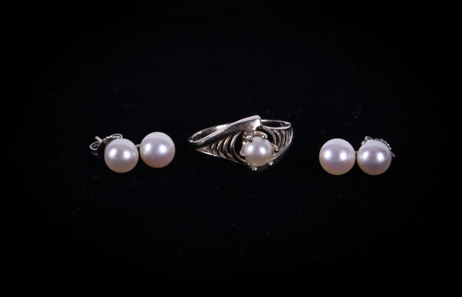 Vintage Cultured Pearl Earrings & Ring set in 14K White Gold: The four pearls on the earrings measure 6.50mm each and the pearl in the ring is 5.40mm. Weight including pearls is 5.2g.