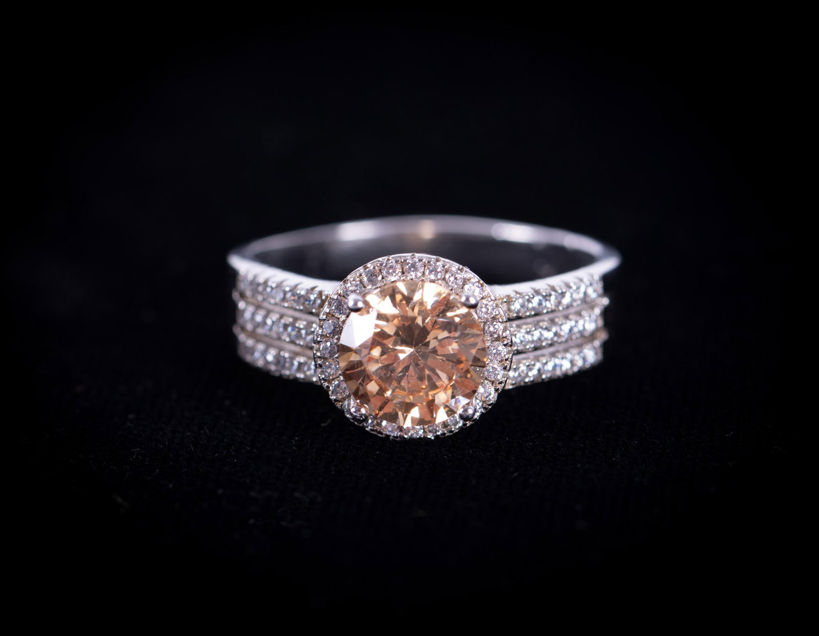 Platinum Ring set with Diamonds & Yellow Tourmaline: The tourmaline in this lovely ring measures 8mm round and has approximately .58ctw in diamonds. The mark is illegible, it tests platinum. Weight including stones is 4.7g and the ring size is 9 1/2.