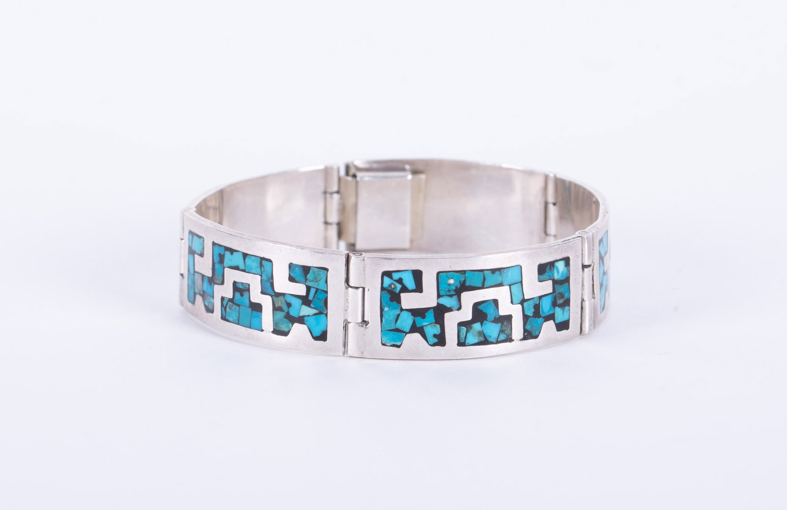 Sterling Bracelet with Inlay: This bracelet is marked Mexico 925. The inlay could be turquoise or enamel. Weight is 50g and the length is 7 1/2 inches.