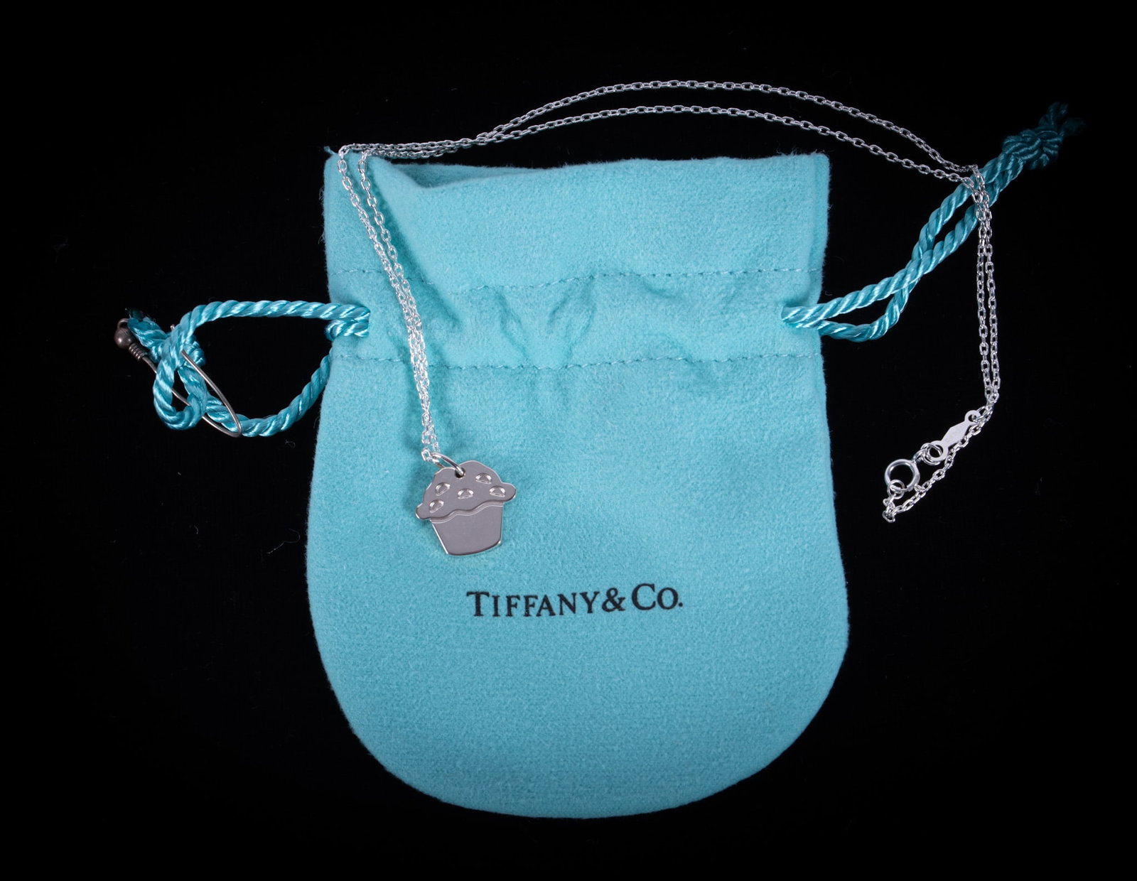 Tiffany & Co Love Muffin Pendant on Chain: This sterling silver Tiffany pendant is on a 16 inch sterling chain. Weight is 3.7g.