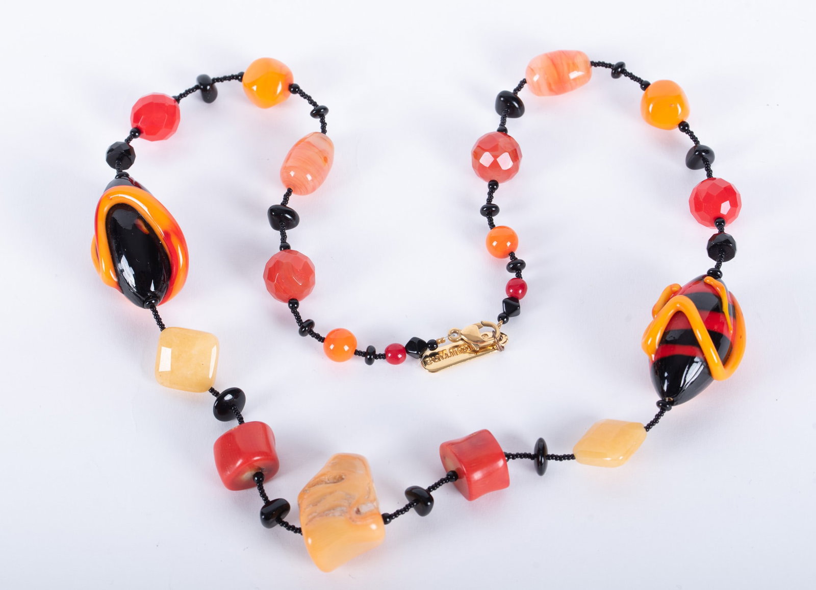 Italian La Murrina Murano Glass and Mixed Hard Stone Bead Necklace: unique hand crafted in Murano Italy with art glass, agate, coral and mixed hard stone bead necklace; length 24 inches.