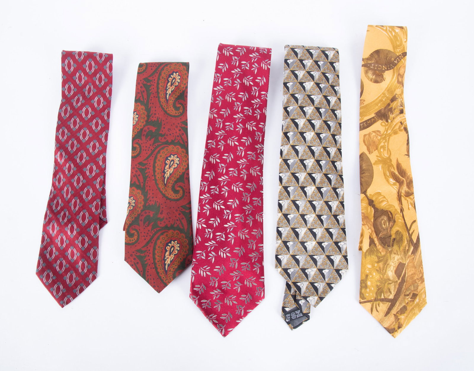 Group of Five Continental Designer Ties by Valentino, Lanvin, Charvet and Ferre: One Valentine Cravatte, Made in Italy, Maroon silk printed tie with oval decoration; one Lanvin Paris black and silver with gold floral design, 100% silk, Made In France; one Charvet Place Ven Dome, P