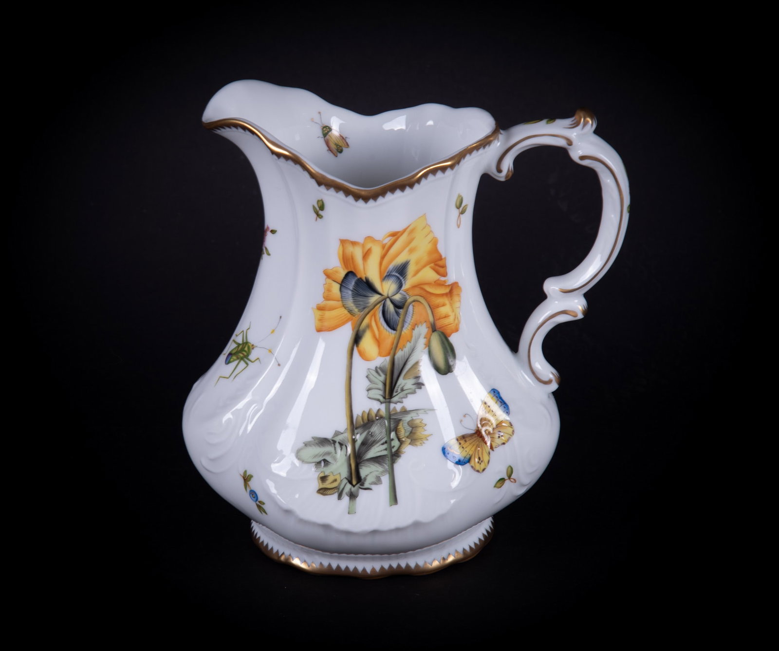 An Anna Weatherley Hand-Painted Porcelain Botanical Pitcher: Hungary, a lovely jug with a large yellow bloom to the front, the front/back/handle decorated with multiple butterflies and insects.