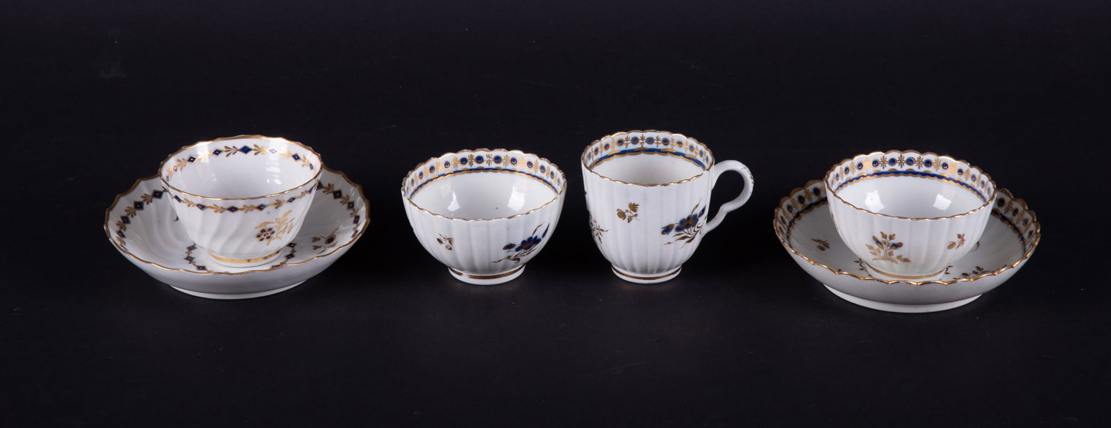 A Group of 18th Century Cream, Gilt and Cobalt Cups and Saucers, Worcester and Caughley (1 of 4)