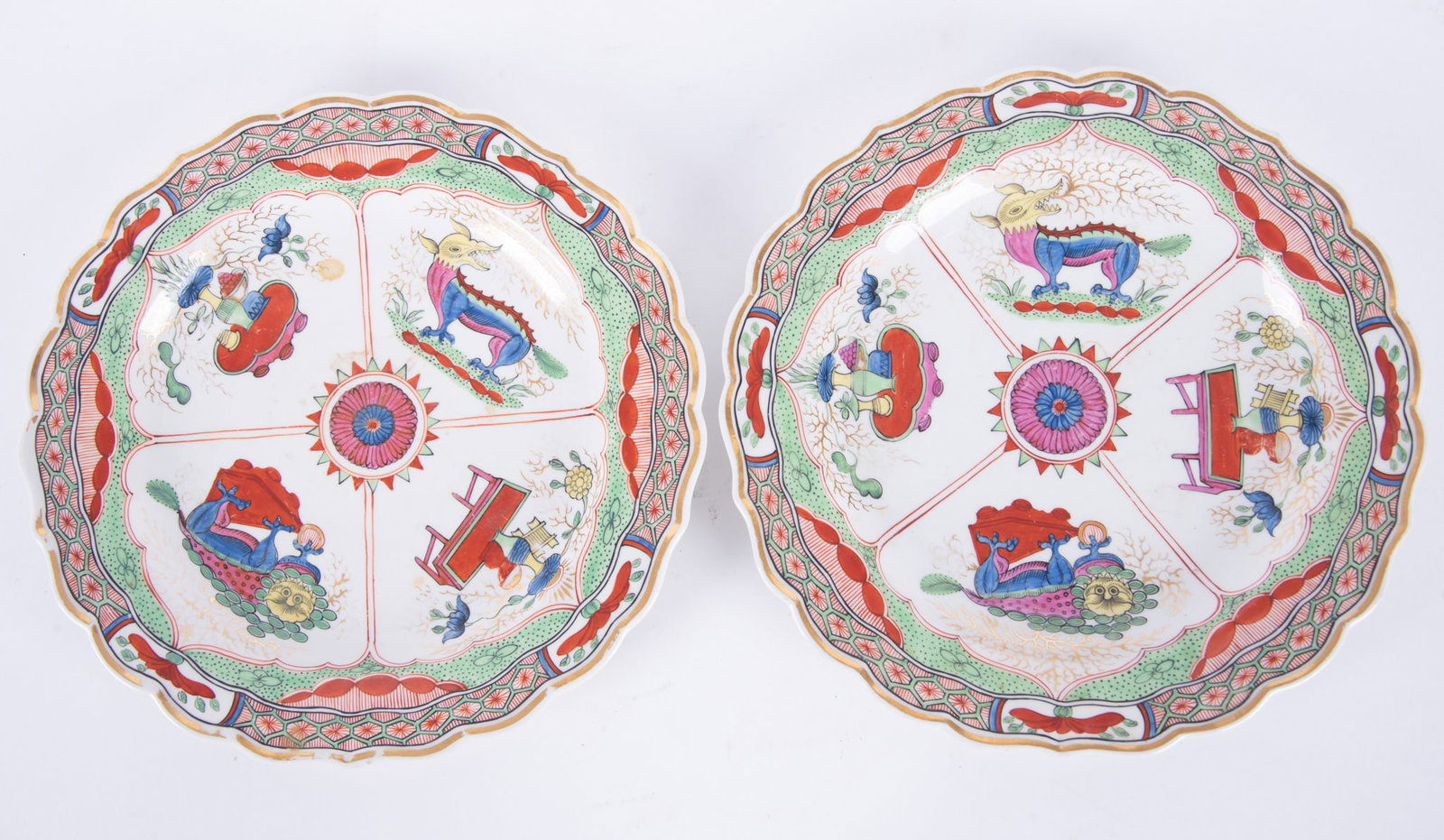 A Rare Pair of "Dragon in Compartments" Porcelain Cabinet Plates (1 of 4)