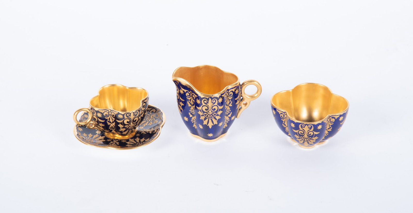 A Rare Coalport Porcelain Cobalt and Gilt Jewel Demitasse Cup and Saucer, with Matching Creamer and (1 of 3)