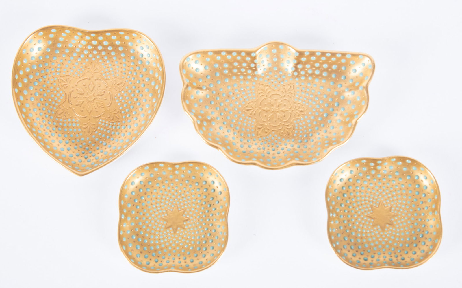 Four Coalport Porcelain Enamel Jeweled Dishes: England, circa 1890, 4 diminutive gold ground and turquoise enameled jeweled nut or trinket dishes. Green Coalport England mark to the underside.