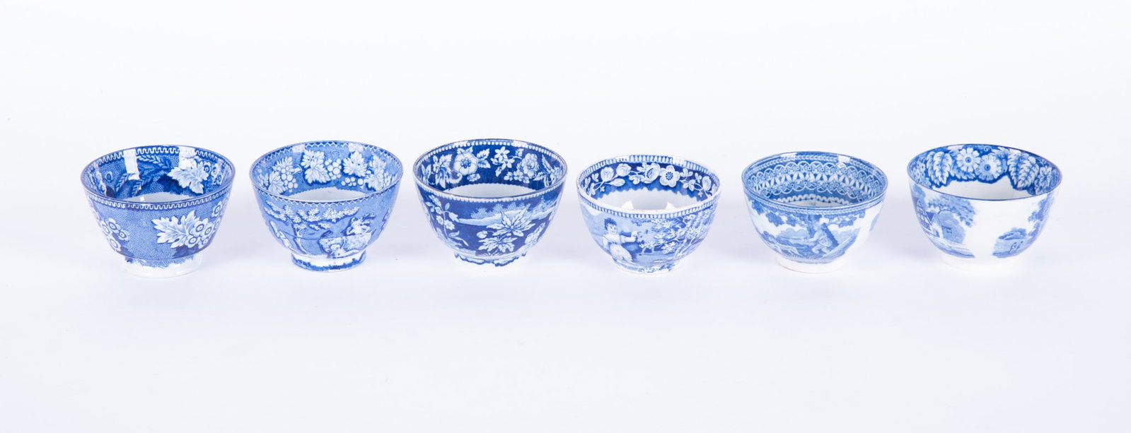 A Collection of Six Staffordshire Blue Transferware Tea Cups (1 of 4)