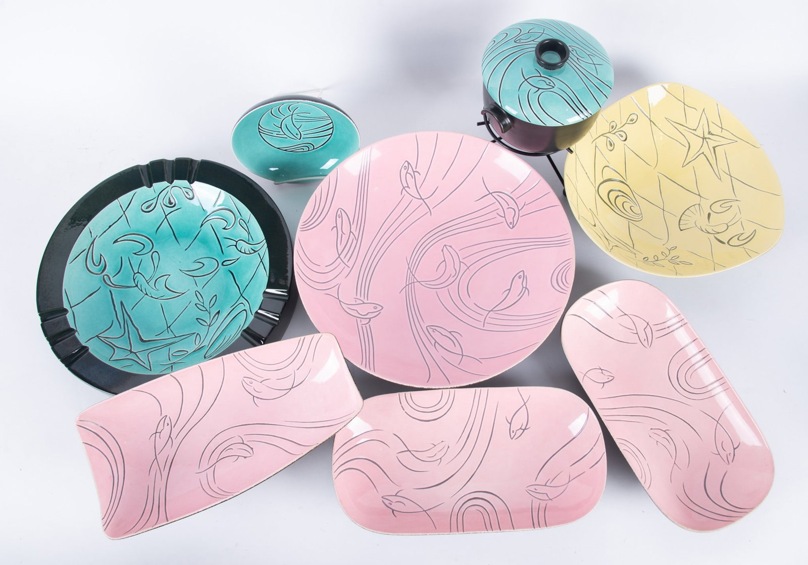 Mid-Century Roselane Pottery: collection of Roselane pottery from the mid-century with aquatic motifs. Including seven decorative bowls and a covered tureen on a stand.