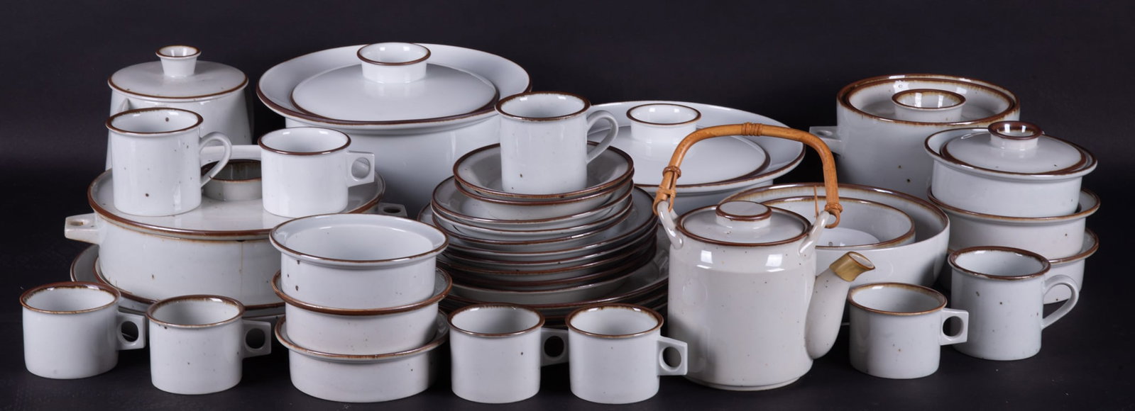 Dansk Brown Mist Stoneware Serving Pieces: Partial set, (50 pieces) Marked Dansk Designs Denmark NR. 6 flat cups with 6 saucers. 3 mugs with saucers. 6 soup bowls. 5 salad plates. 4 dinner plates. 3 bread plates. 2 side bowls. 2 serving bowls.