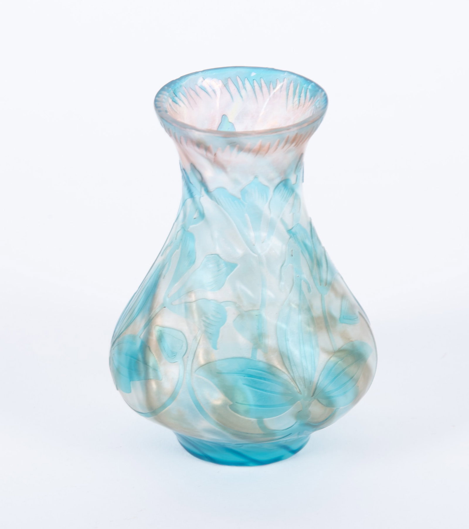 A Fine Art Nouveau Cameo Glass Cabinet Vase, Cristallerie de Pantin: France, circa 1905, a mold blown vase with acid etch back floral design on a mottled ground. Marked to base: Cristallerie de Pantin STV & C. (for Stumpf, Touvier, Viollet & Co).The Cristallerie de Pan