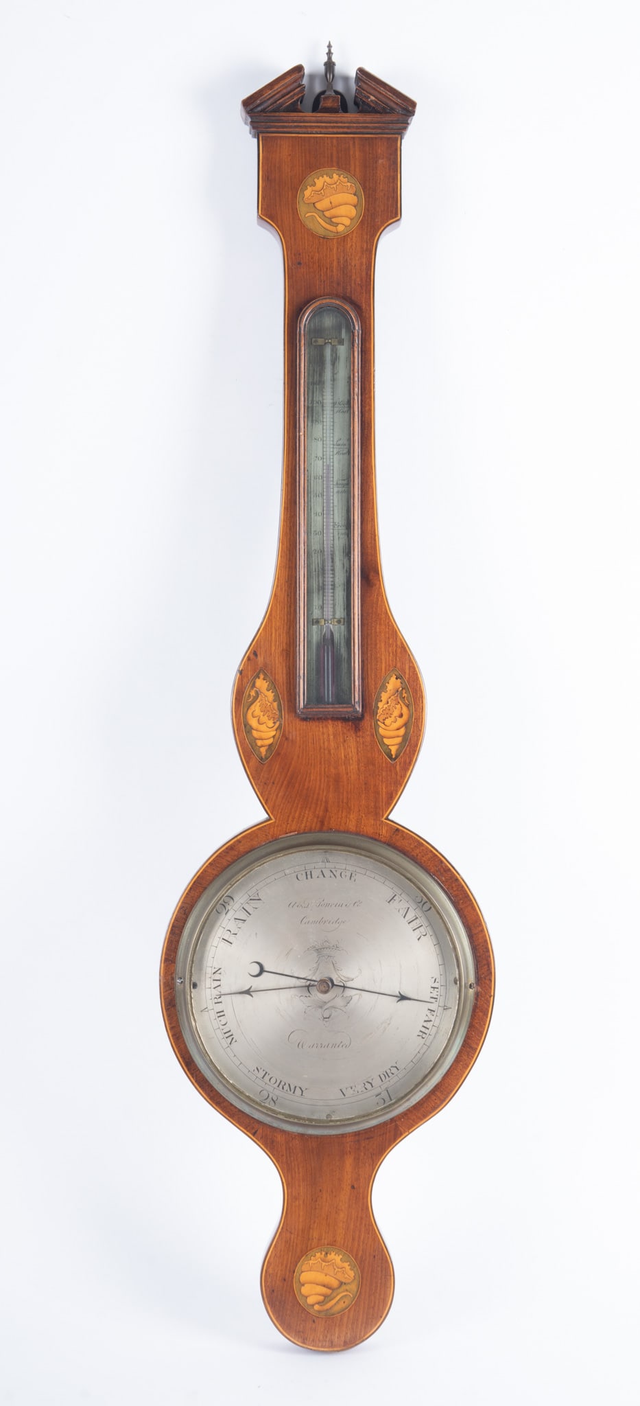 Antique English George III Mahogany Wheel Barometer: Antique English George III Mahogany Wheel Barometer Swan neck pediment centering an urn form finial above a thermometer and inlaid design conch shell designs and a silvered engraved dial marked Cambri