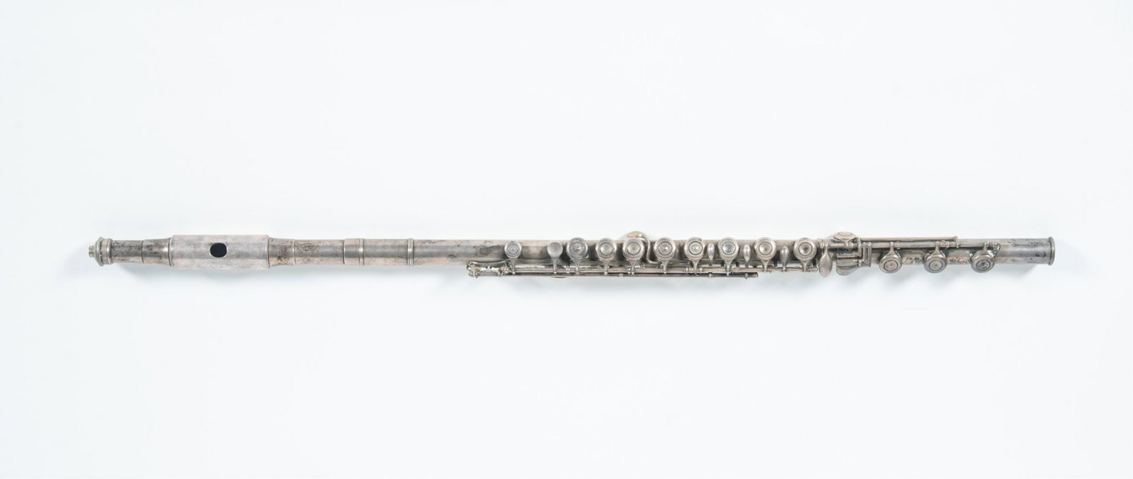 Charles Monzani (American), Silver Plated Brass Flute, Circa (1867-1869): Charles Monzani (American), Silver Plated Brass Flute, Circa (1867-1869) An example of this flute is in the permanent collection of the Metropolitan Museum of Art Length: 28 1/2 inches