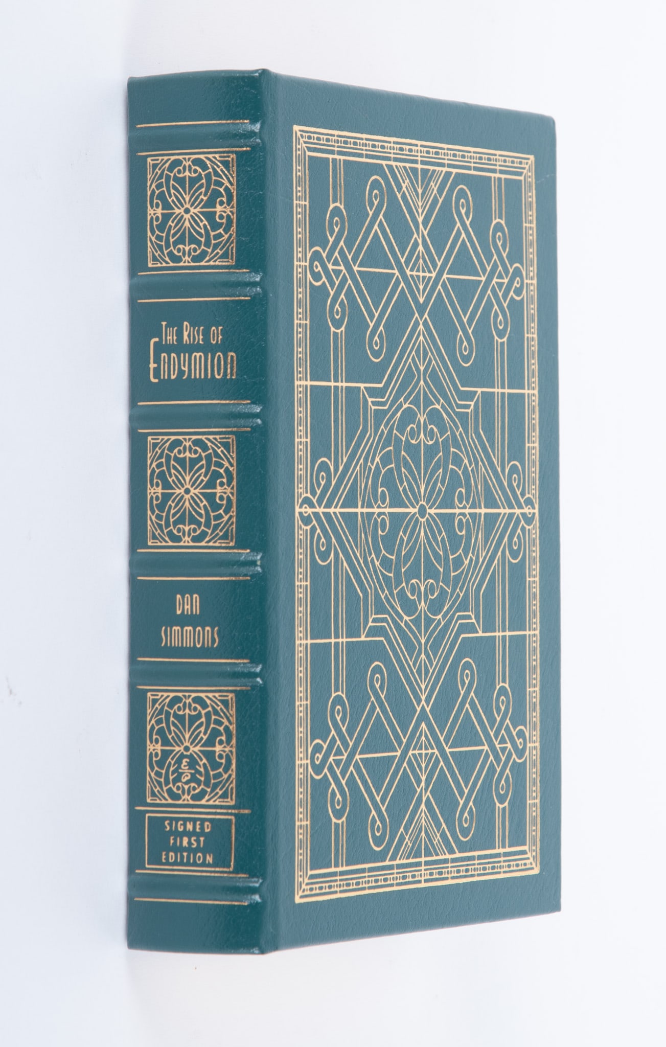 Dan Simmons: The Rise of Endymion. Signed first edition. Easton Press, 1997.: Dan Simmons: The Rise of Endymion. Signed first edition. Easton Press, 1997. No. 261 of 900 copies, signed by Simmons on the limitation page. Certificate of Authenticity laid in. 9 1/2 x 6 3/8 x 1 7/8