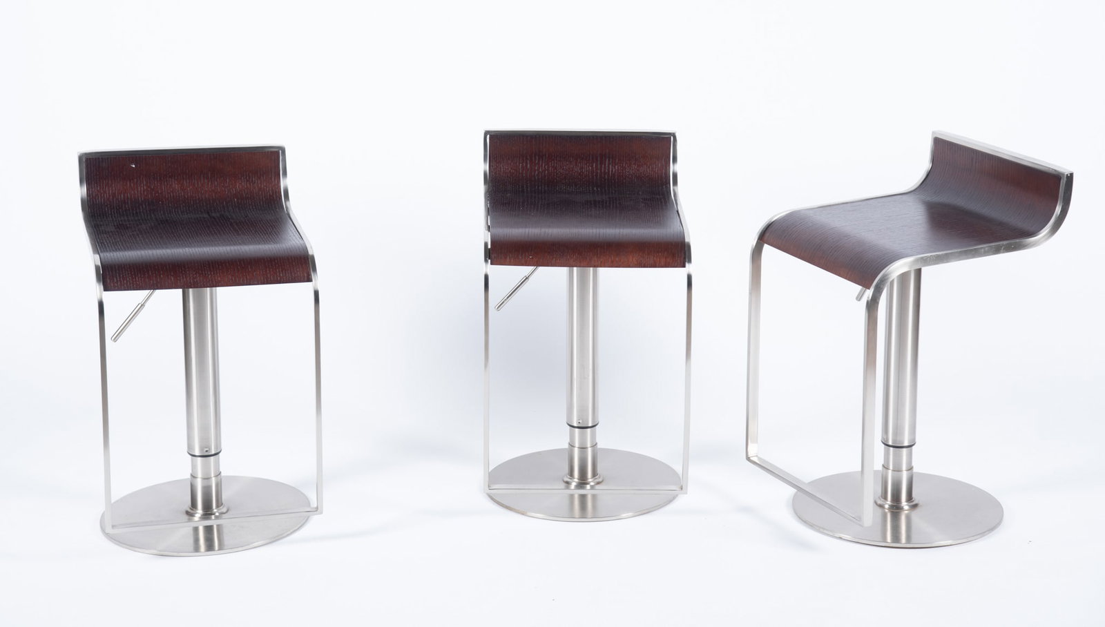 Three MCM Piston Bar Stools (1 of 4)