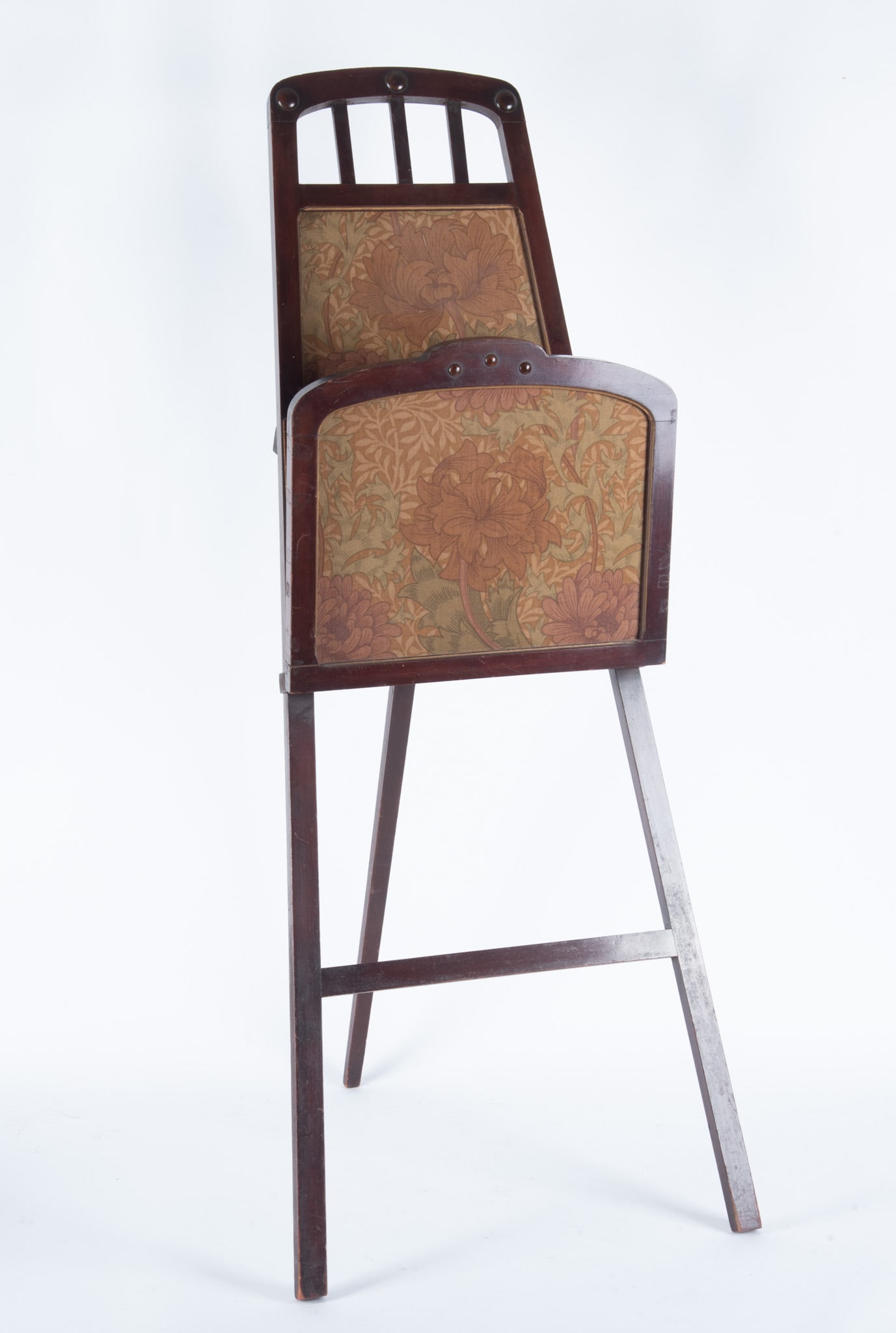 An Antique Art Nouveau Floor Model Canterbury for Periodicals: An Antique Art Nouveau Floor Model Canterbury for Periodicals A beautifully Art Nouveau upholstered fabric inset into a wooden frame. An easel style folding design. When displayed open measures 43 x 2