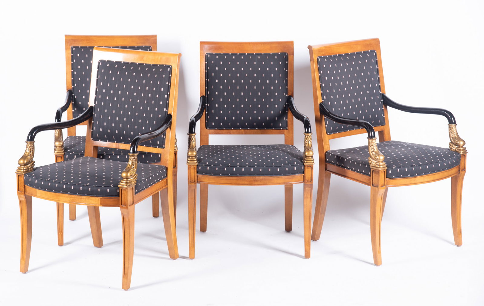 Set Of Four Century Furniture Twentieth Century Regency Arm Chairs: Set Of Four Century Furniture Twentieth Century Regency Arm Chairs Straight head rails above upholstered backs and seats with repetitive pattern centering a pair of ebonized arms with gilt dolphin for