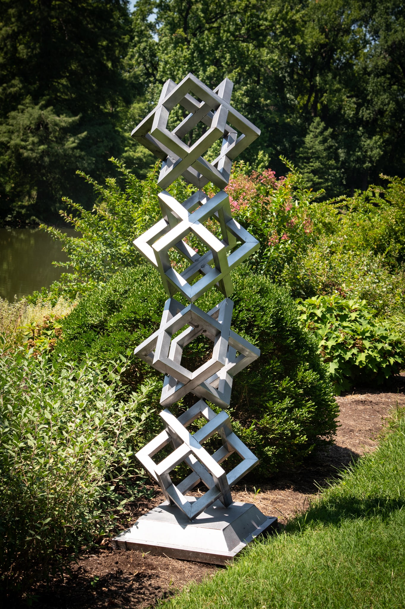 Contemporary Stacked Cube Metal Outdoor Sculpture: Contemporary Stacked Cube Metal Outdoor Sculpture finished with titanium paint. Height: 92 inches