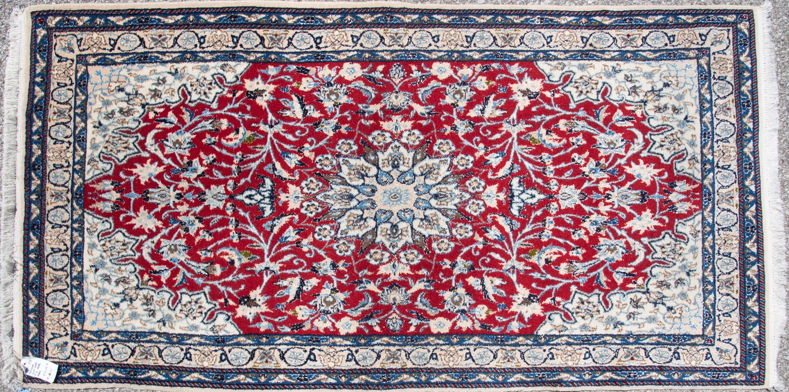 Handwoven Persian Nain: Handwoven Persian Nain Wool and silk inlay having a central floral medallion on a red field with all over flowering vines centering ivory spandrels. 3' 2" x 6' 2"