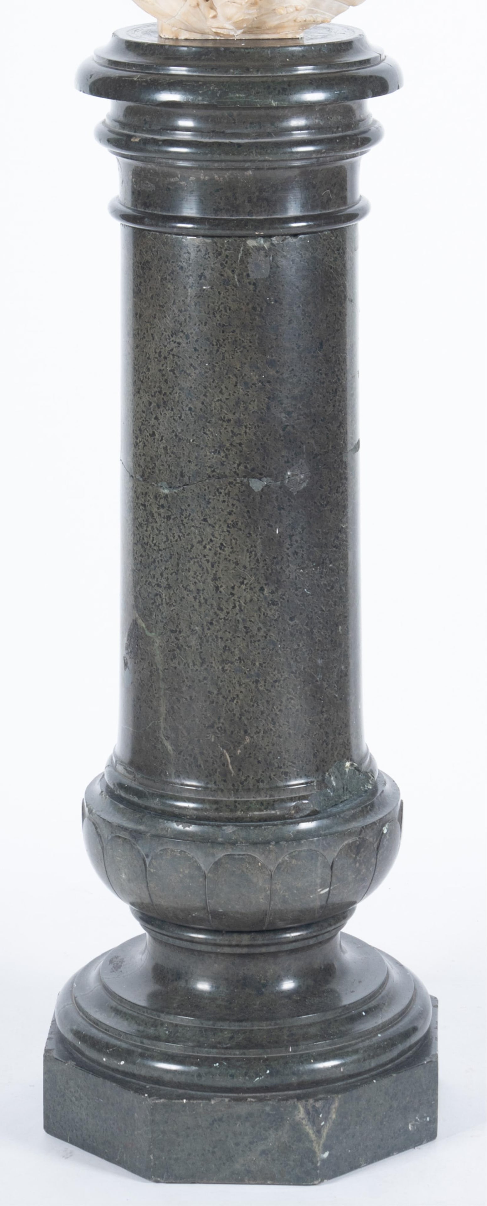 Green Marble Column Pedestal: Four pieces. Octagonal base. Top portion measure 32 1/2 inches. Lower portion measures 15 inches including half bowl. (marble bust not included). 48 x 16 x 16 inches (overall)