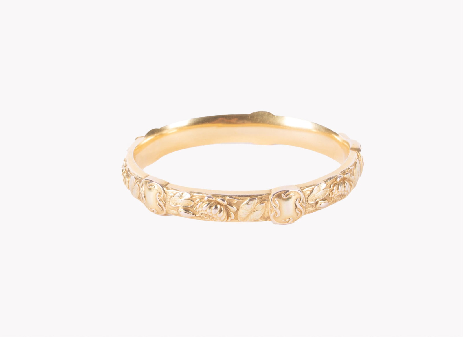 A Fine 14K Gold Art Nouveau Period Bangle Bracelet, Riker Brothers: A Fine 14K Gold Art Nouveau Period Bangle Bracelet, Riker Brothers Newark, circa 1890, an Art Nouveau 14k gold bracelet by the famed New Jersey jeweler Riker Brothers. The bangle features 5 cartouches
