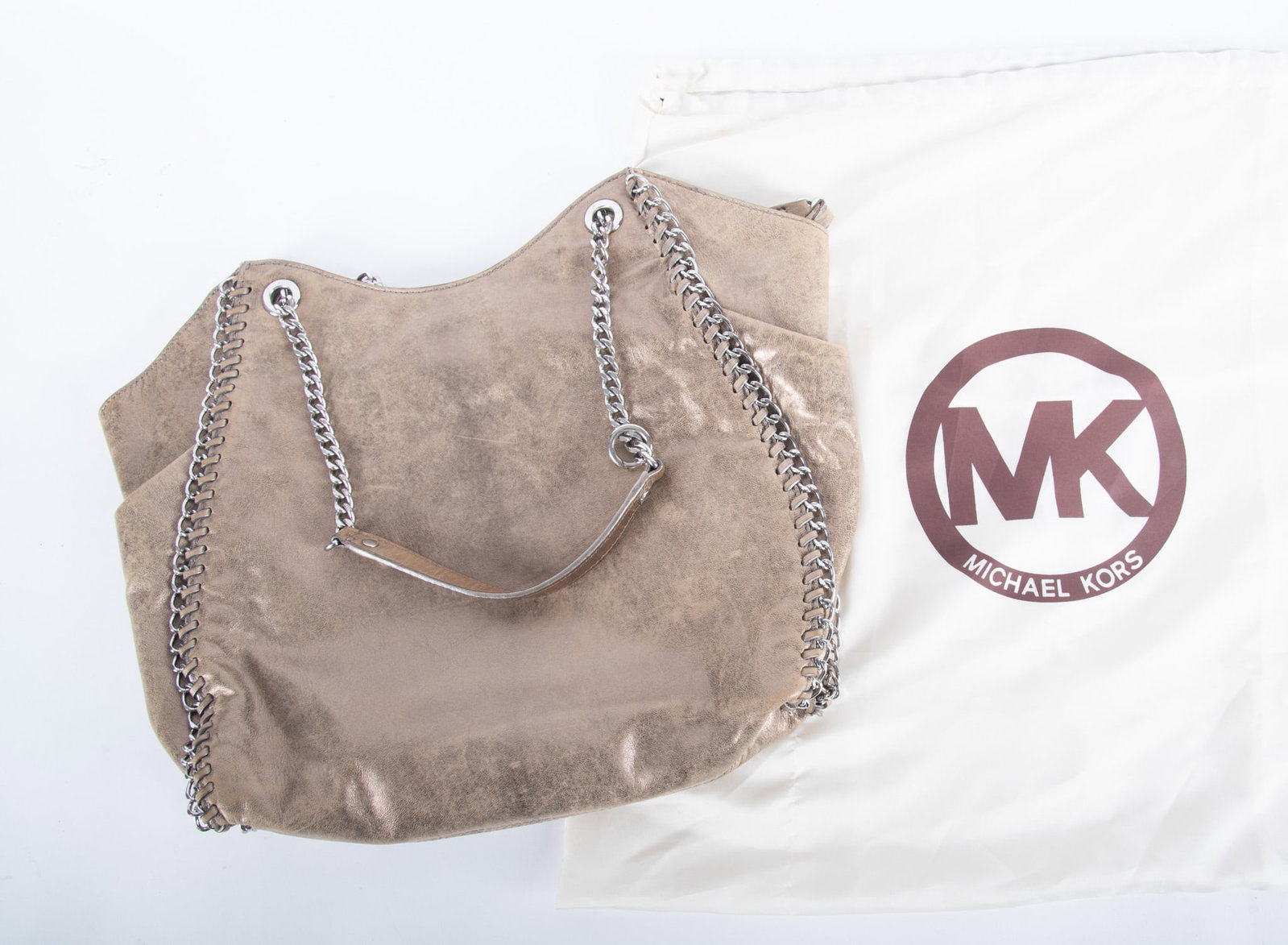 Vintage Michael Kors Metallic Gold and Brown Leather Large Tote Bag: Vintage Michael Kors Metallic Gold and Brown Leather Large Tote Bag with leather and chain handle; chain strung along side perimeter of bag; age appropriate wear; size 13 x 12 x 7 inches; with Michael