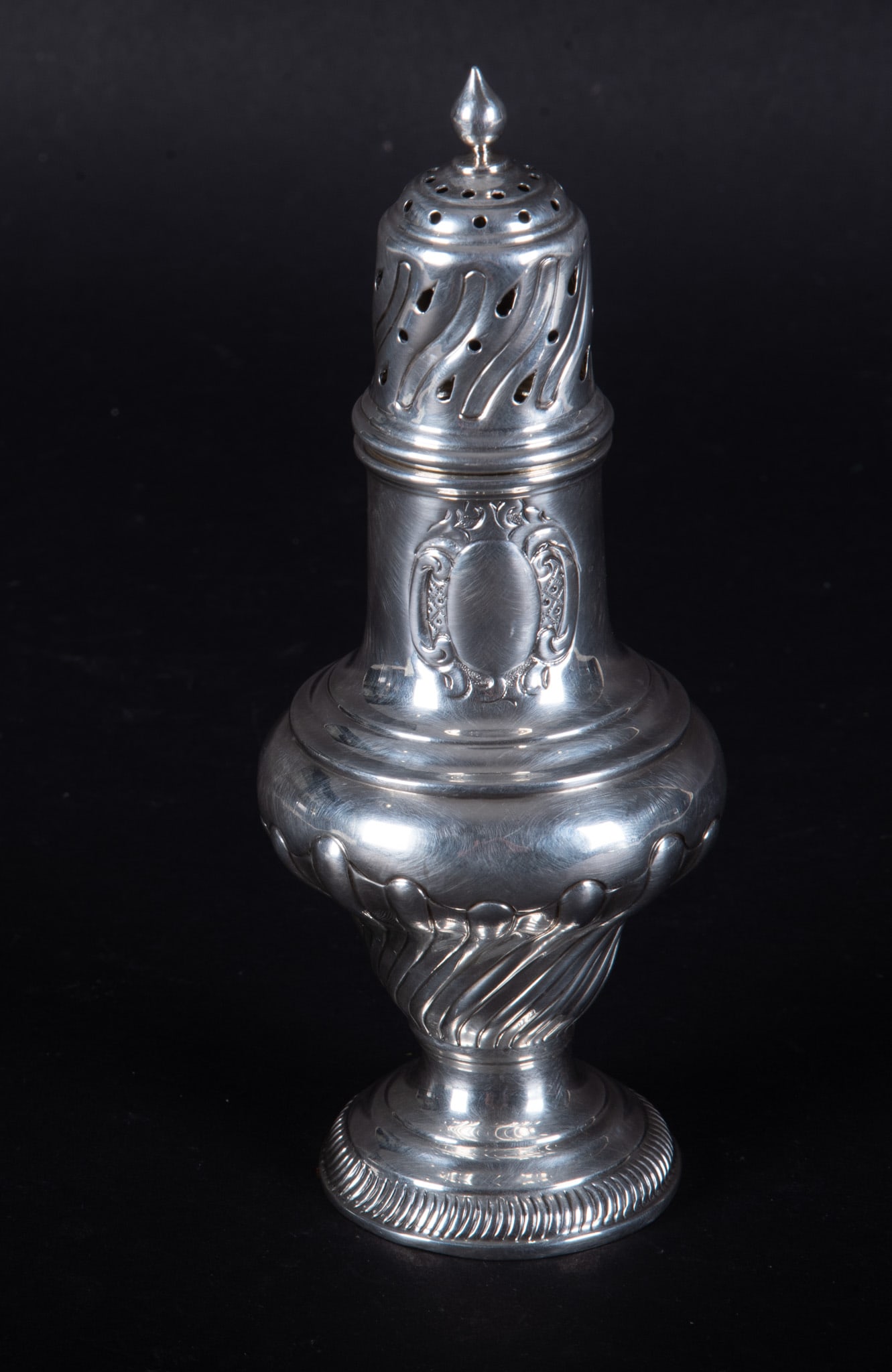 An English Sterling Silver Muffineer, Circa 1893: An English Sterling Silver Muffineer, Circa 1893 England, circa 1893, maker: William Richard Corke, a sterling silver classical style shaker. Weight 5.15 troy ounces 7 1/4 inches tall