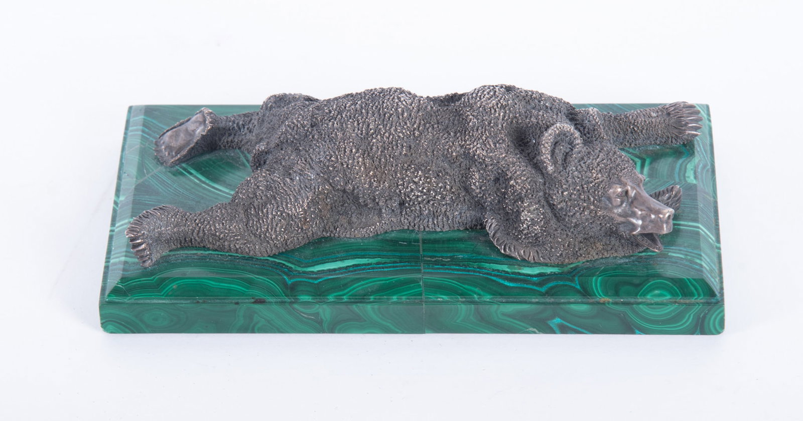 A Russian Silver and Malachite Bear Paperweight, 20th Century: A Russian Silver and Malachite Bear Paperweight, 20th Century Russia, a finely modeled recumbent bear, sprawled across a malachite base. Marked with 84 silver standard and spurious Faberge marks.