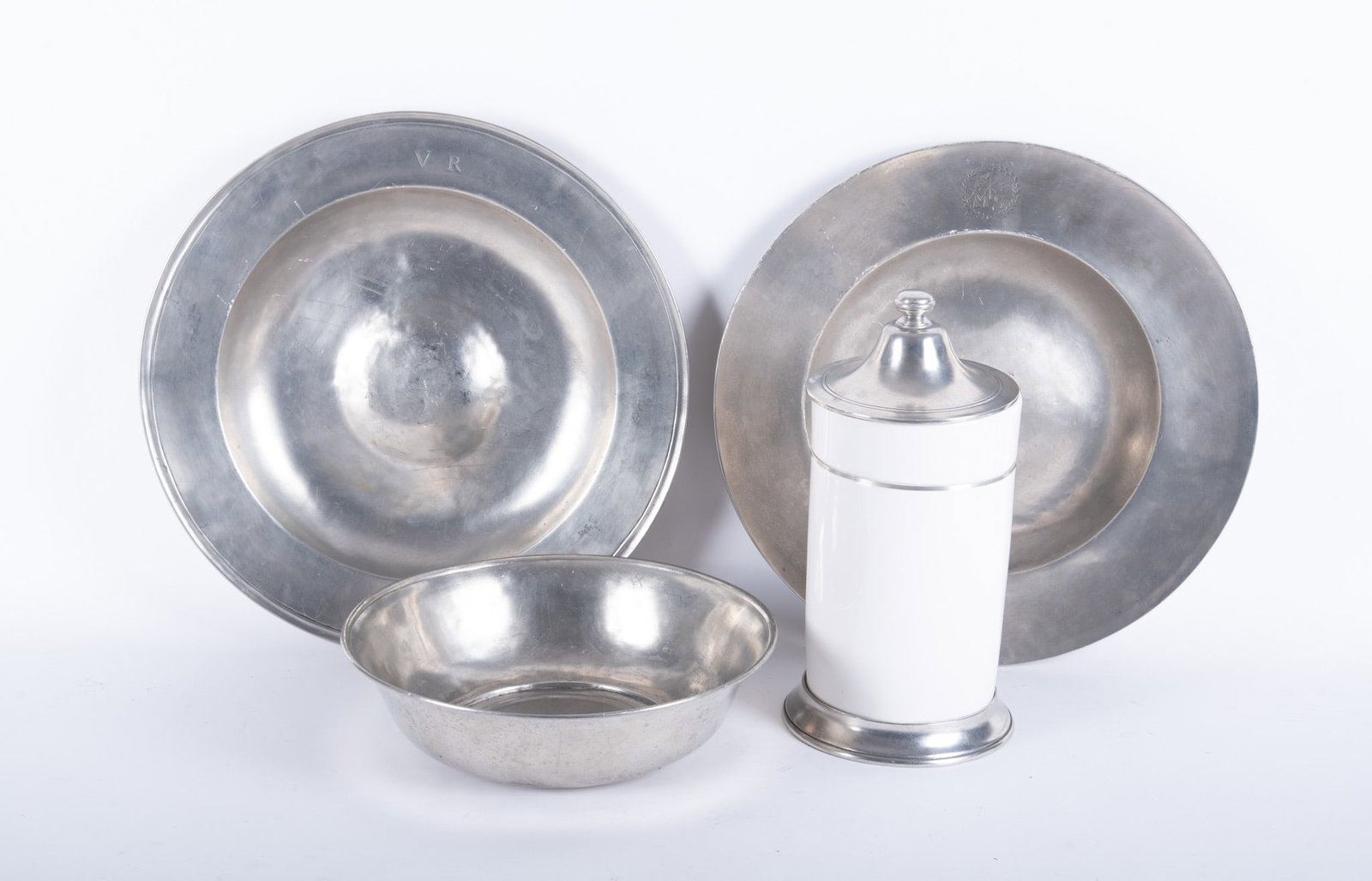 Two Match Modern Italian Pewter Chargers, a Match Convivio Pewter and Pottery Cannister, and a: Two Match Modern Italian Pewter Chargers, a Match Convivio Pewter and Pottery Cannister, and a Pewter Serving Bowl The chargers bear Match labels and marks to the underside and are monogrammed V.R. an