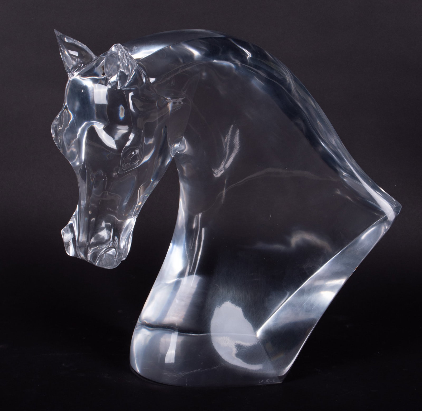 A Large Lalique Crystal Horse Head, Tete de Cheval: A Large Lalique Crystal Horse Head, Tete de Cheval France, from a 1953 design by Marc Lalique, a very large crystal sculpture in the form of a horse head, marked Lalique in block letters to front of b