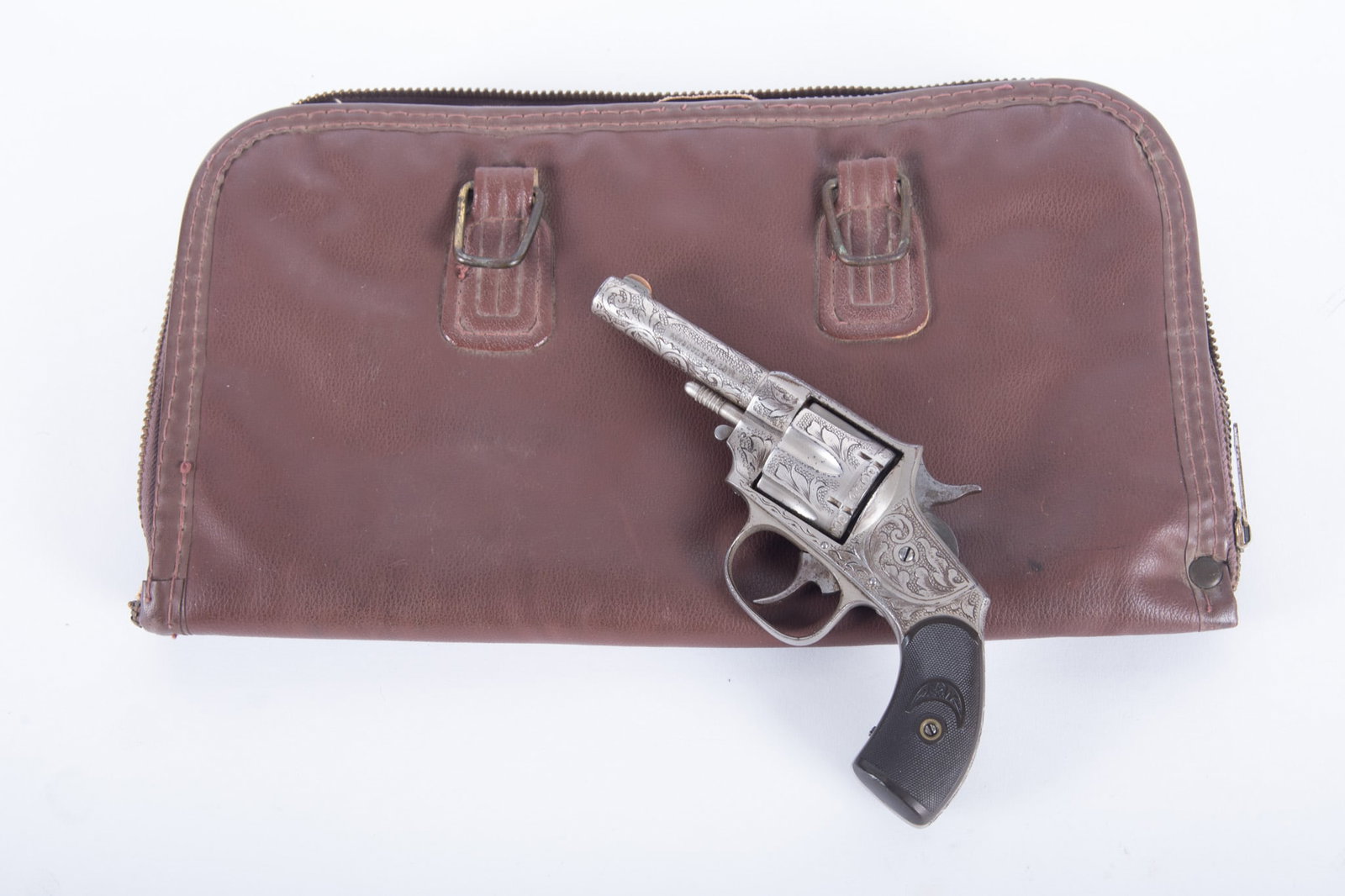 Forhand And Wadworth Factory Engraved 32 Revolver: Forhand And Wadworth Factory Engraved 32 Revolver 1877 with factory engraved nickel plated barrel, body and hammer with plastic grip. Serial number 6497. Length: 7 inches