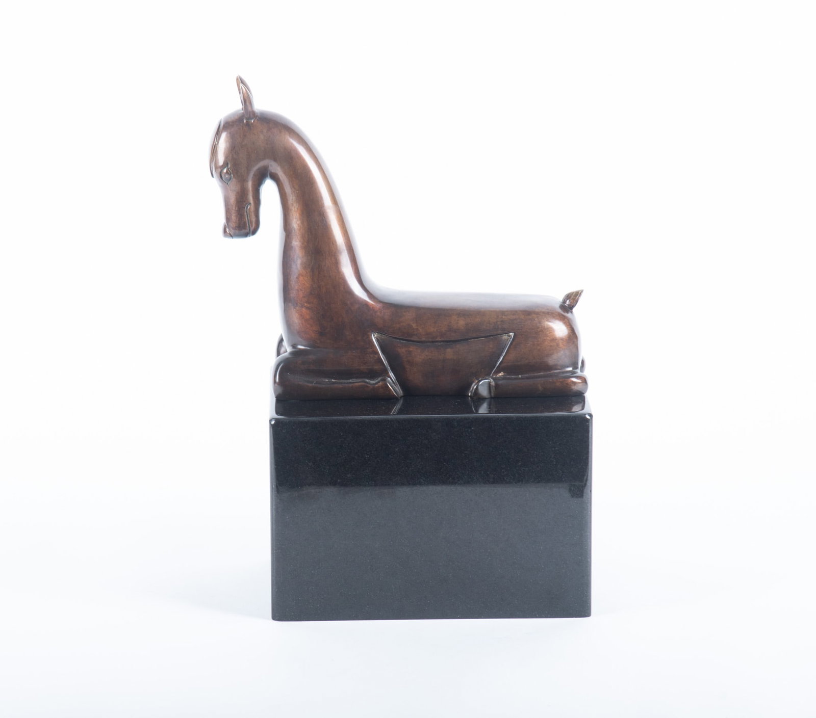 Mid Century Modern Brass Stylized Recumbent Horse: Mid Century Modern Brass Stylized Recumbent Horse Unmarked, on a black marble plinth. Height of sculpture: 9 inches; Overall with plinth: 15 inches