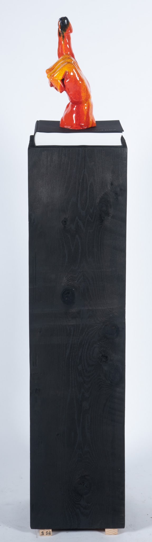 Nicolas Guagnini, Argentina (b. 1966), Him, 2014, Vitrified glazed ceramic on book base and plinth: Nicolas Guagnini Argentina, (b. 1966) Him, 2014 Vitrified glazed ceramic on book base and plinth Donated to benefit the Contemporary Art Museum St. Louis 63 x 11 3/4 x 11 3/4 inches (overall)