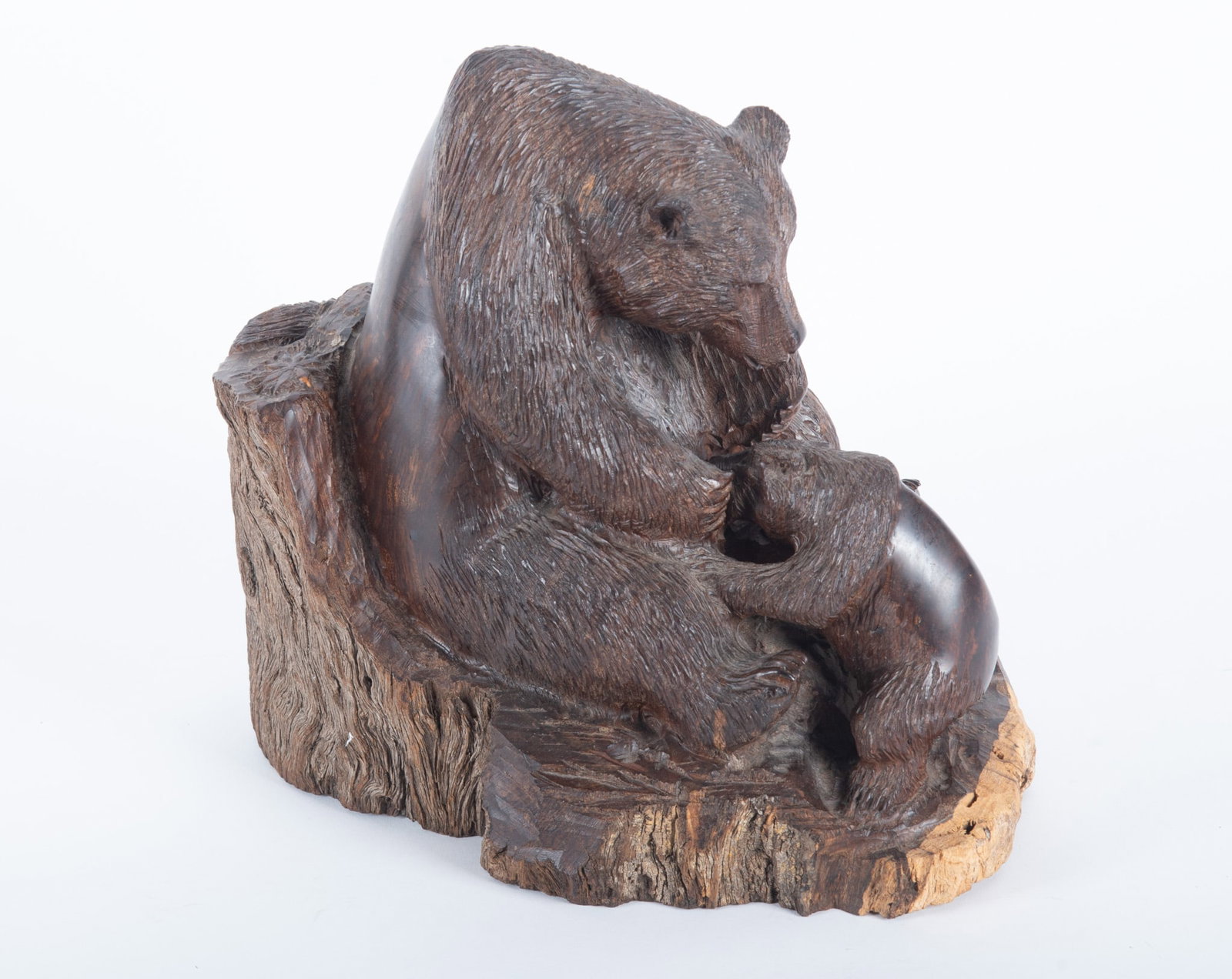 Ramon DC and Thomas Suby Carved Ironwood Bear and Cub: Ramon DC and Thomas Suby Carved Ironwood Bear and Cub Signed on the underside. Features a Mother bear nursing a cub. Weight 19 pounds 11 1/2 x 12 1/2 x 8 inches