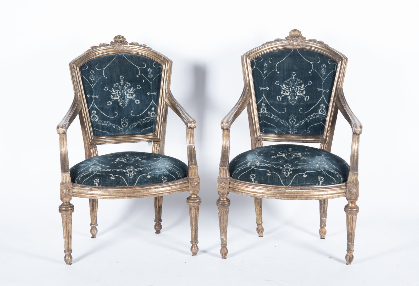 Pair of Louis XV Style Fauteuil Armchairs: Pair of Louis XV Style Fauteuil Armchairs Late 20th century Louis XV style armchairs with distressed silvered finish and upholstered in dark velvet fabric with decorative damask pattern. 39 x 26 x 20