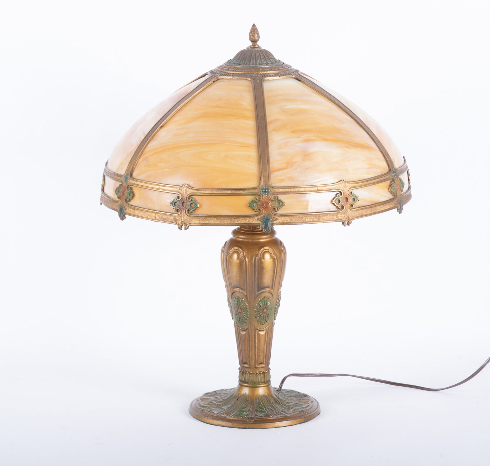 Art Deco Style Slag Glass Lamp: Art Deco Style Slag Glass Lamp In the style of Edward Miller, caramel coloring slag glass panels surrounding by brass. Shade is 8 1/2 inches height, 18 3/4 inches diameter. Vintage wiring. 24 x 19 x