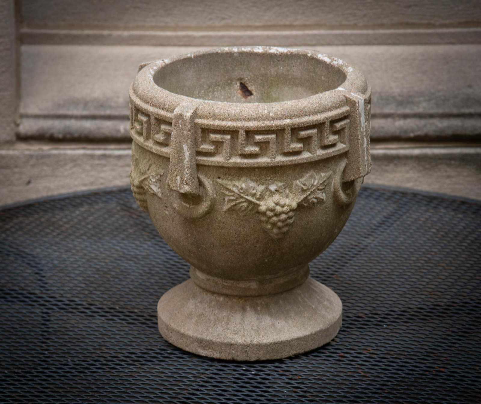 Cast Stone Grecian Style Planter: Cast Stone Grecian Style Planter Features a detailed border in the geometric Greek key design and grape bunches. 13 1/2 x 13 1/2 x 13 1/2 inches