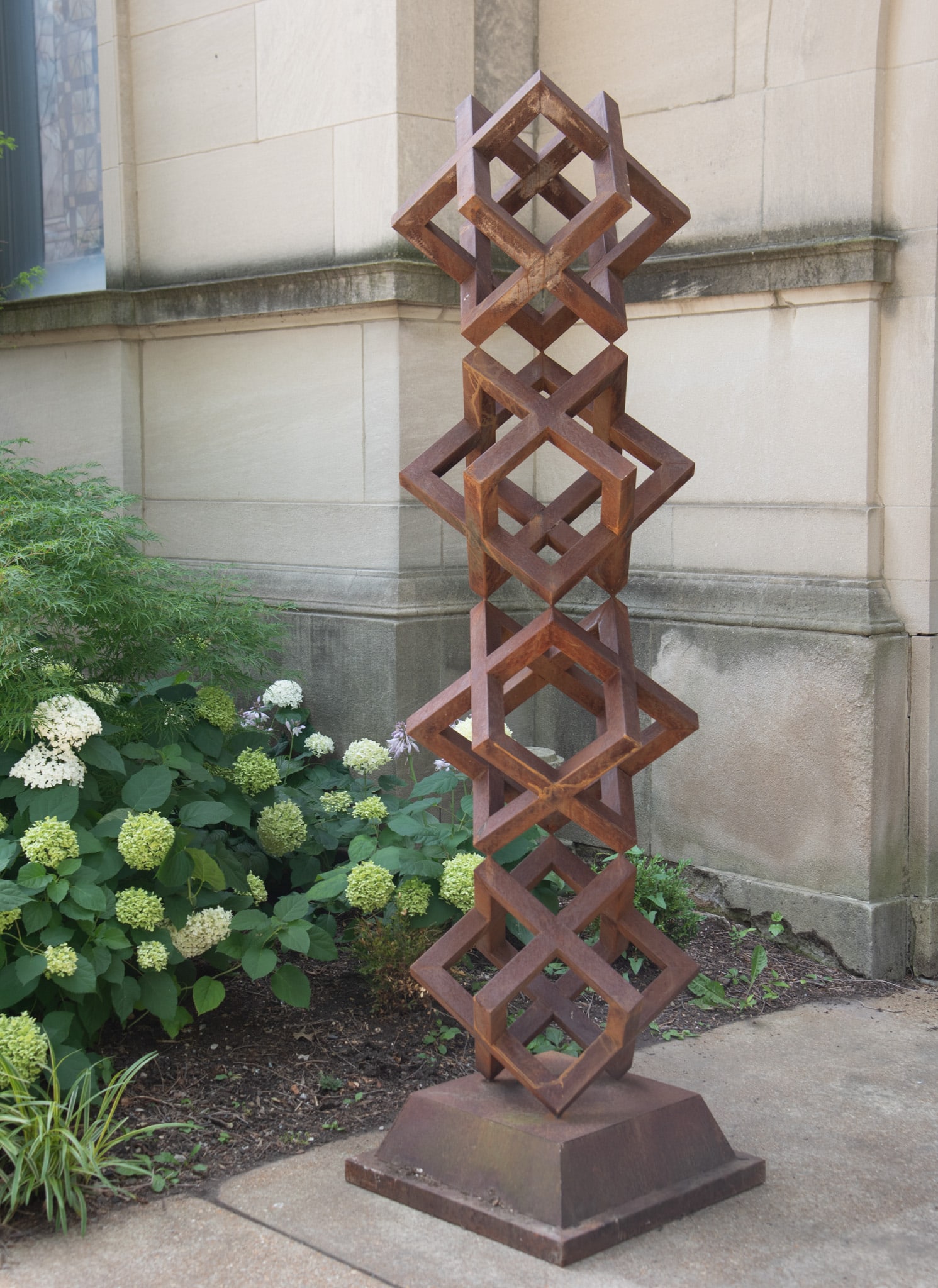 Modernist Stacked Open Cube Brushed Metal Outdoor Sculpture: Modernist Stacked Open Cube Brushed Metal Outdoor Sculpture Tall garden metal sculpture with four stacked cubes on a stepped and shaped base. 8 Feet tall (96 inches) on a 26 x 26 inch base. 96 x 26 x 