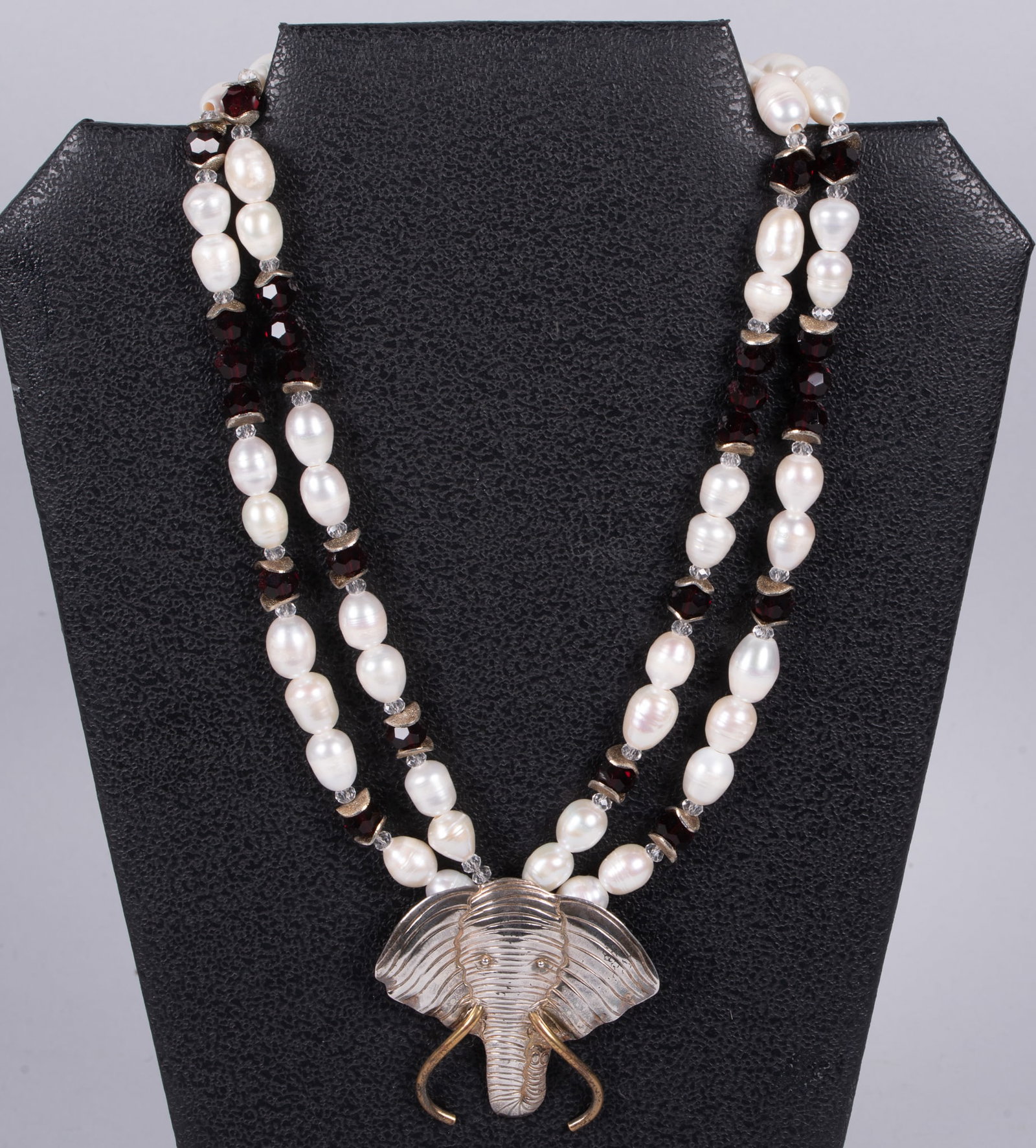 Sterling Silver Elephant Pendant with FWP & Crystal Beads: Sterling Silver Elephant Pendant with FWP & Crystal Beads Elephant sterling silver/brass pendant necklace with fresh water pearls and garnet tone crystal beads-pewter clasp. Length 18 inches, pendant 