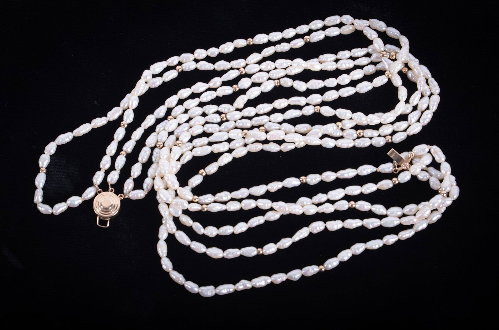 Fresh Water Pearl Necklace w/ 14K Clasp & Beads: Fresh Water Pearl Necklace w/ 14K Clasp & Beads This 5 strand necklace is 17 inches long.