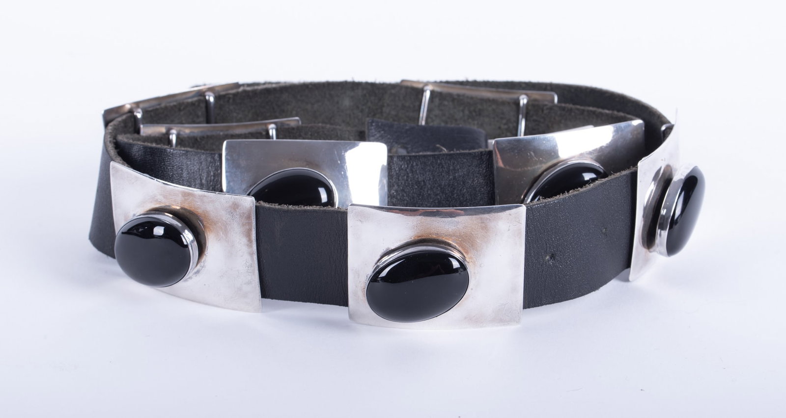 Vintage Sterling Silver Concho Belt with Onyx: Vintage Sterling Silver Concho Belt with Onyx The bezel set onyx in this great belt are a little offset within the rectangular sterling silver pieces, which makes it designer looking. Each of the 9 co