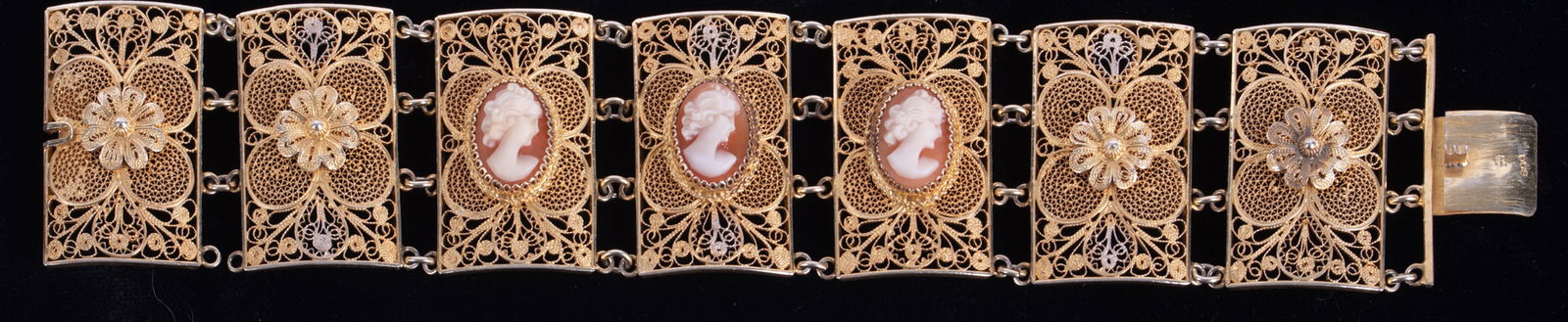 Vermeil Filigree Cameo Bracelet: Vermeil Filigree Cameo Bracelet This lovely bracelet is 800 silver. It is 1 1/2 inches wide and 7 inches long. There are three cameos measuring 13 x 10.50mm.