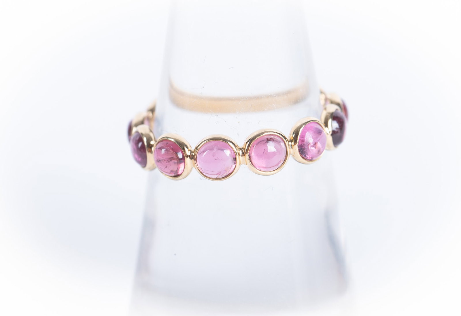 18K Gold Natural Pink Tourmaline Band Ring: 18K Gold Natural Pink Tourmaline Band Ring total weight 7.75 carats, tourmaline 3.21 carats. Size 6.50