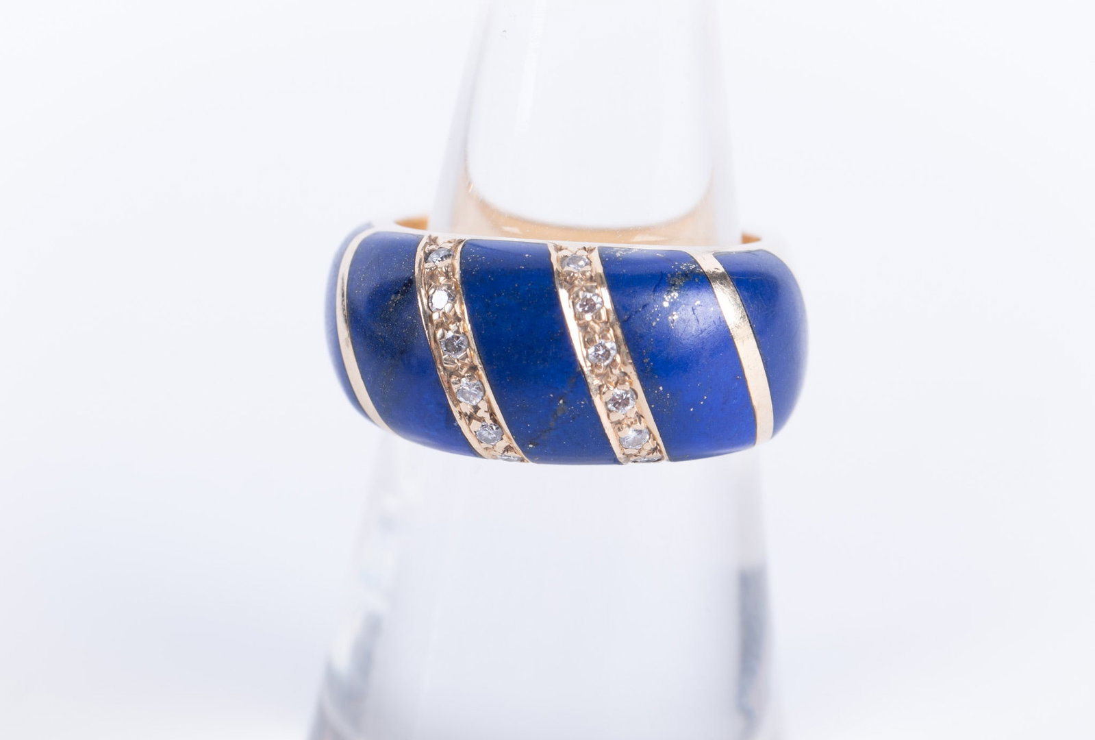 14K Yellow Gold Lapis & Diamond Ring: 14K Yellow Gold Lapis & Diamond Ring This bold vintage style ring has two rows of diamonds separating the lapis sections weighing approximately .20CTW. The ring has a square shank and is size 6 1/2.
